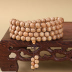 Xigura Patina handcrafted sandalwood wood bracelet, scale and proportion view for a warm, quiet home.