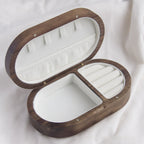 Xigura Patina handcrafted walnut jewelry box, natural grain detail for a warm, quiet home.