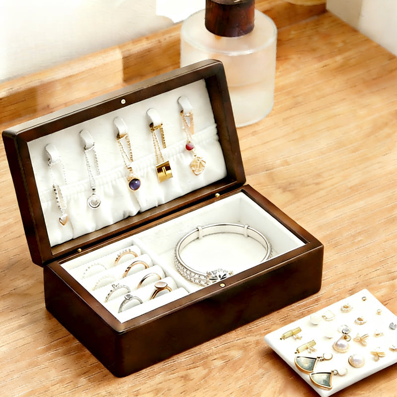 Xigura Patina handcrafted pine jewelry box, main view in soft natural light for a warm, quiet home.