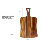 Xigura Patina handcrafted acacia serving board, slow living setting for a warm, quiet home.