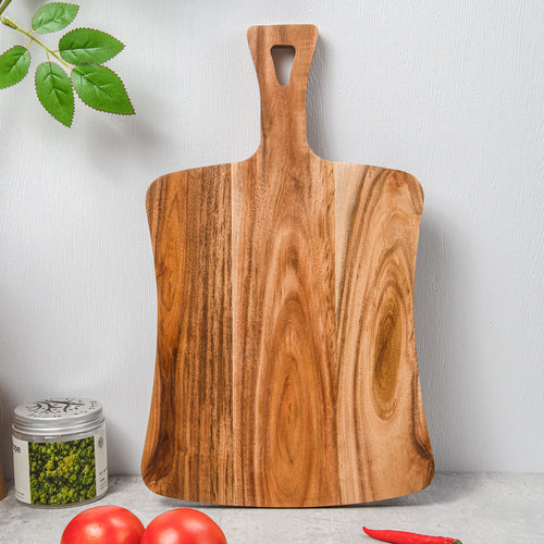 Xigura Patina handcrafted acacia serving board, natural grain detail for a warm, quiet home.