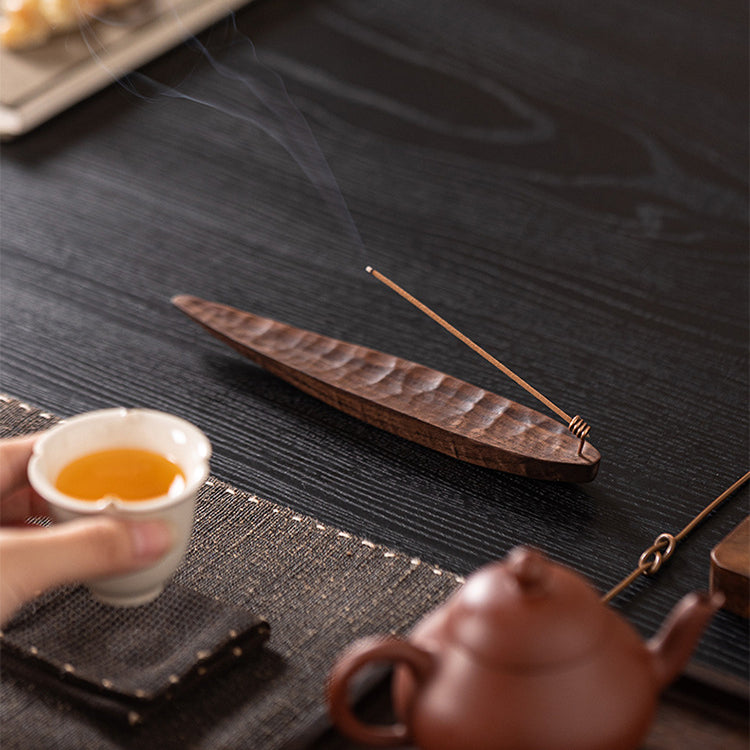 Black walnut incense holder creating a calm atmosphere for meditation, yoga, reading, or quiet moments at home.