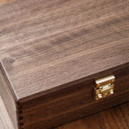Black walnut keepsake box presented as a thoughtful gift for storing personal memories and meaningful belongings.