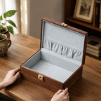 Interior view of a black walnut keepsake box with a soft lined compartment for storing jewelry, letters, photos, and treasured items.