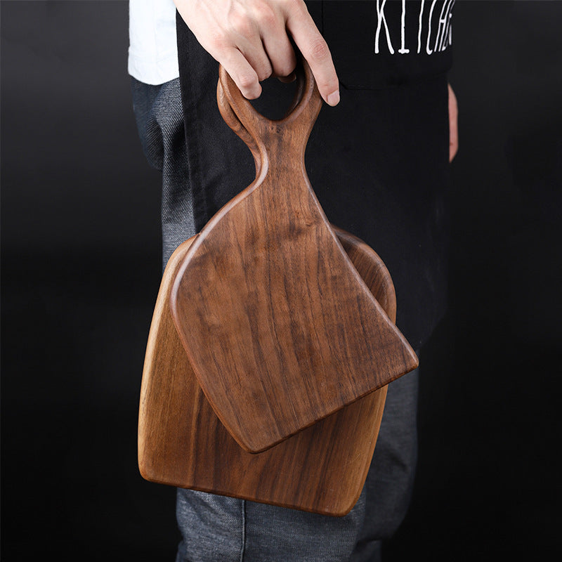 Black walnut serving board with artisan bread, perfect for breakfast, bread serving, and kitchen presentation.