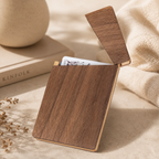 Handcrafted black walnut wood business card holder with a slim rectangular design and natural wood grain.