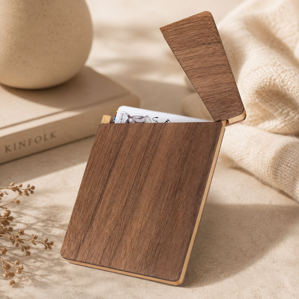 Handcrafted black walnut wood business card holder with a slim rectangular design and natural wood grain.