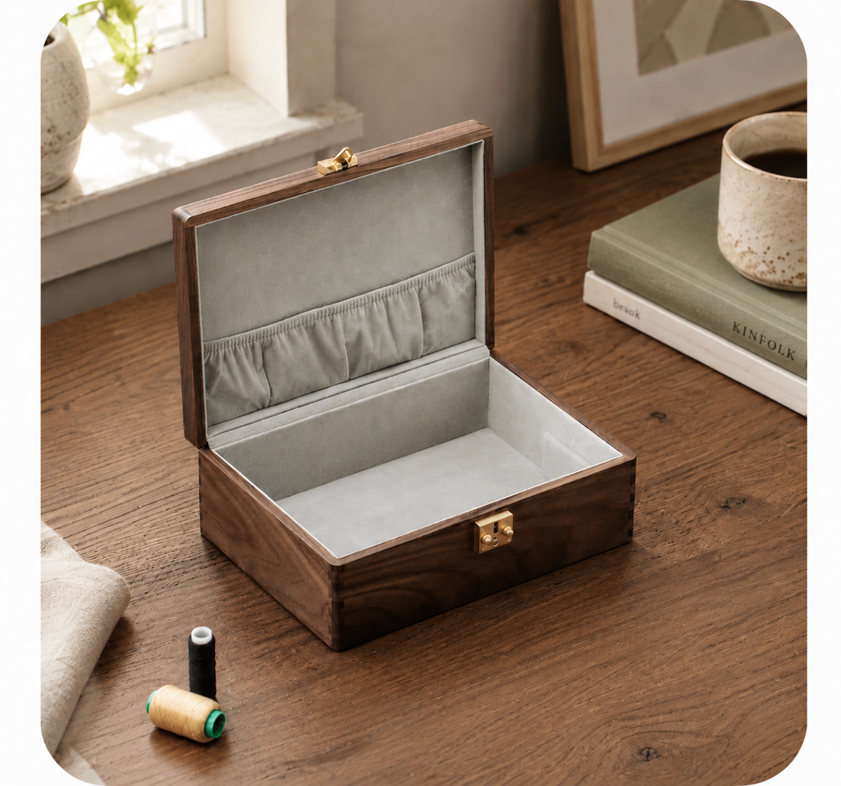Open black walnut wood keepsake box displayed on a wooden table, showing the soft interior lining and handcrafted design.