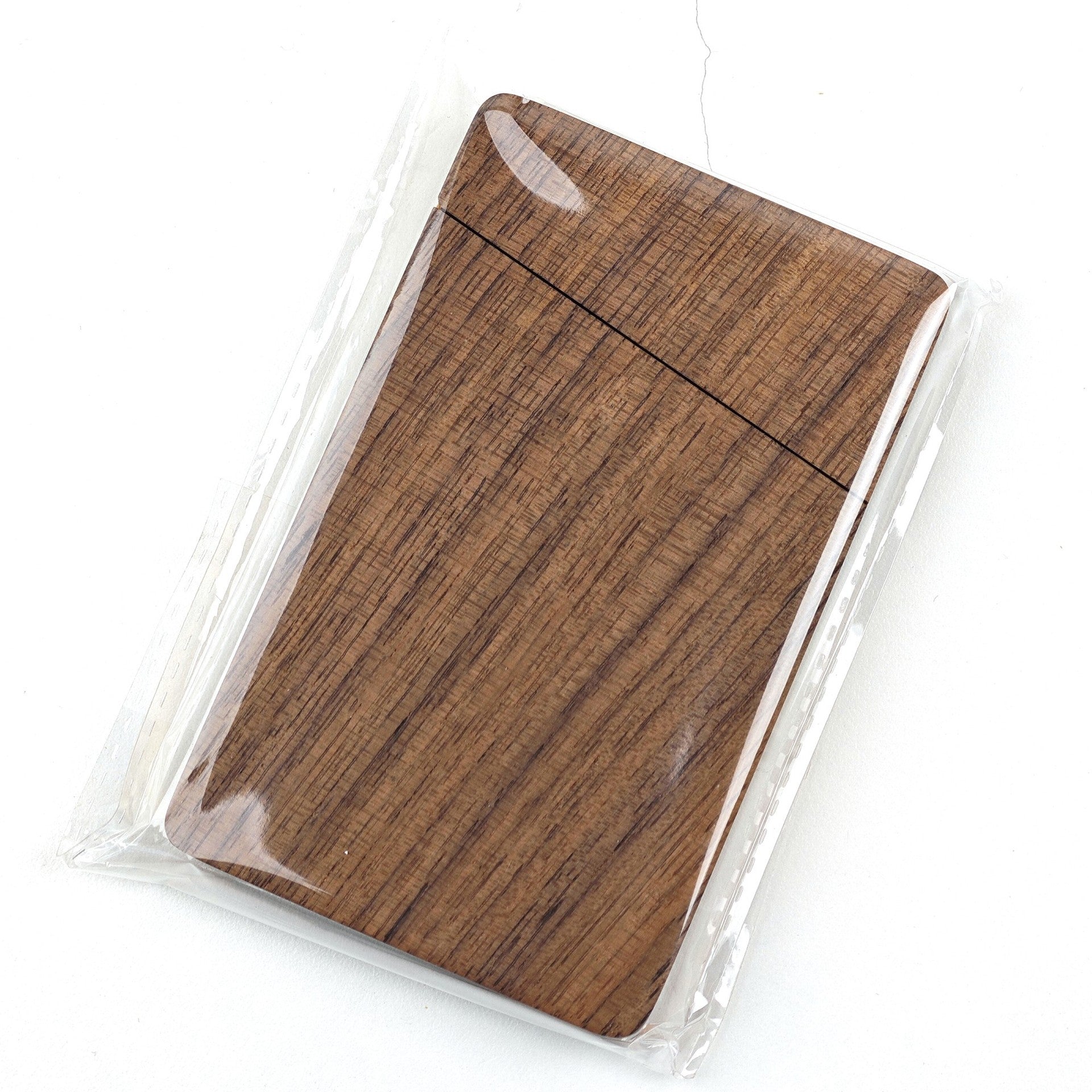 Close-up detail of handcrafted solid wood card holder finish
