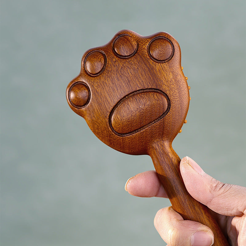 Close-up detail of safe rounded wooden teeth kids comb texture