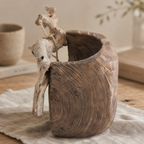 Handcrafted paulownia wood bowl featuring an organic shape, smooth edges, and natural wood character.