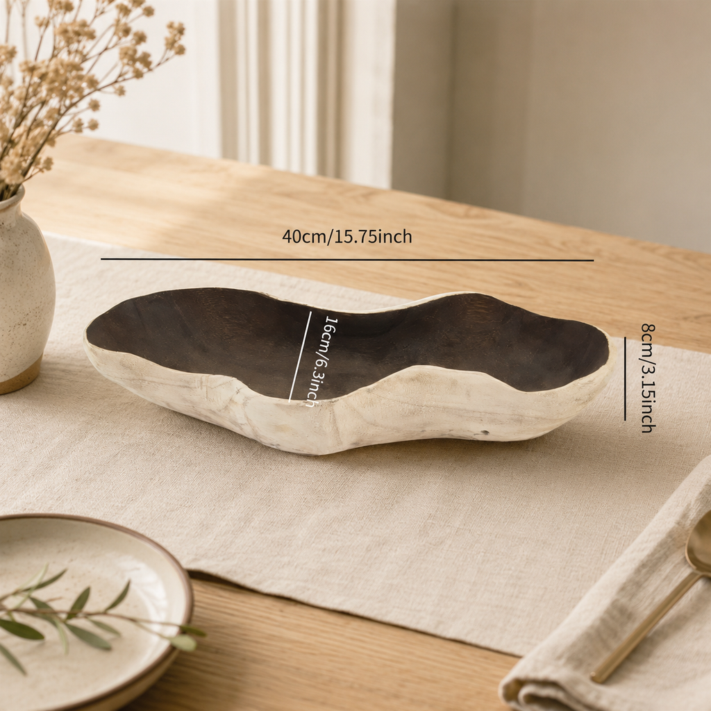 Close-up detail of the handcrafted paulownia wood fruit tray, highlighting the natural grain, texture, and artisan finish.