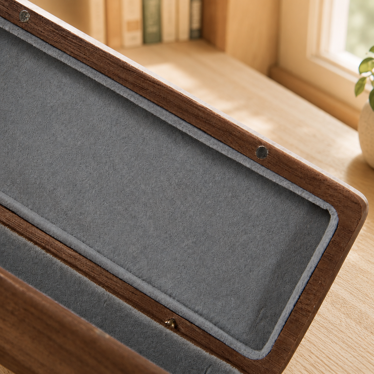 Handmade walnut eyeglass box highlighting the polished edges, natural texture, and careful craftsmanship.