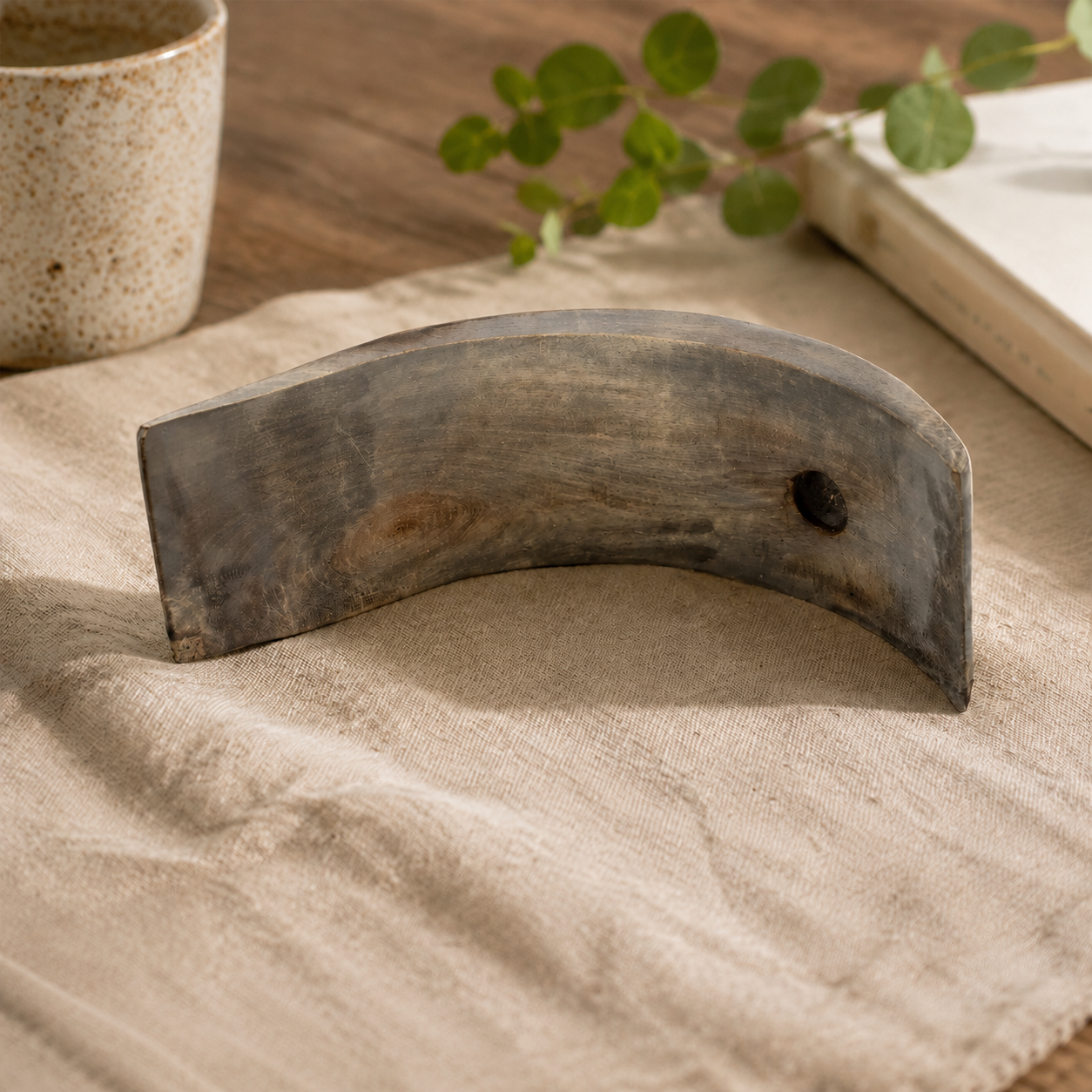 Handmade wooden wine display placed in a dining area, combining functional storage with rustic home decoration.