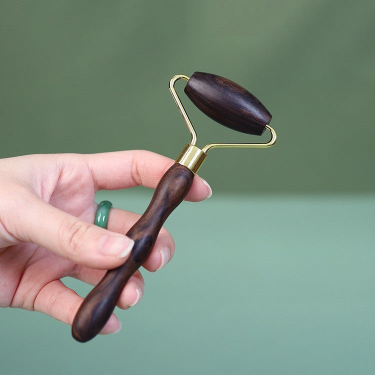 Handmade solid wood facial massage roller for skincare routine