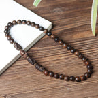 Minimalist wooden bead bracelet crafted from natural wood