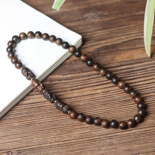Minimalist wooden bead bracelet crafted from natural wood