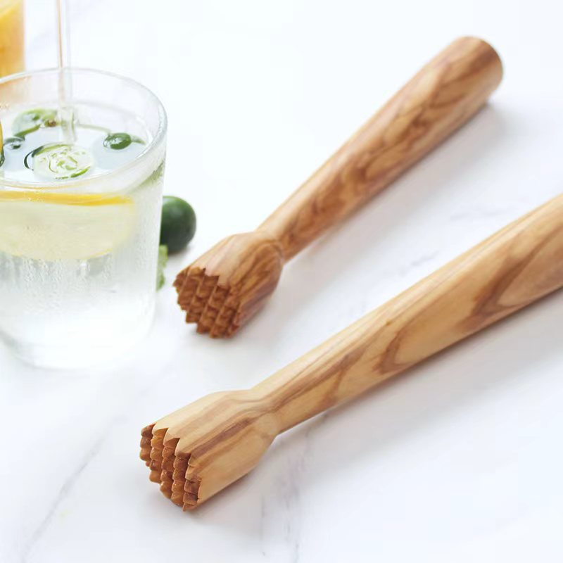 Handcrafted olive wood lemon squeezer and ice crusher for cocktails, lemonade, and home bartending.