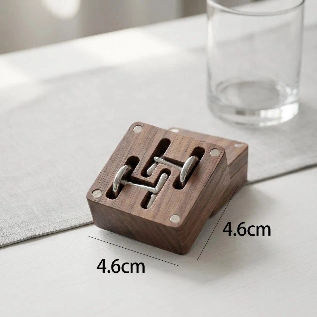 Open view of wooden cufflink storage box with organized compartments