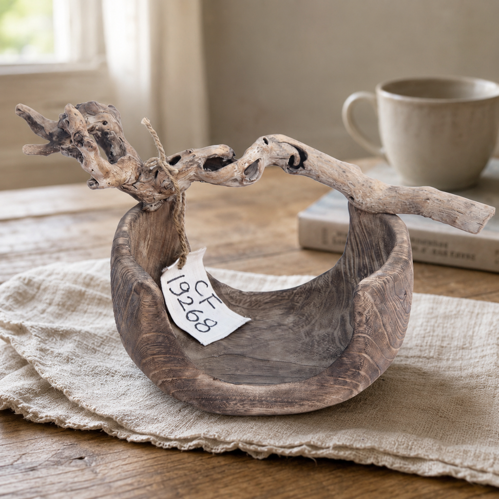 Close-up of handcrafted paulownia wood fruit bowl showing organic grain patterns and unique handmade details.
