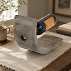 Close-up view of handcrafted paulownia wood wine holder showing natural grain patterns and unique handmade details.