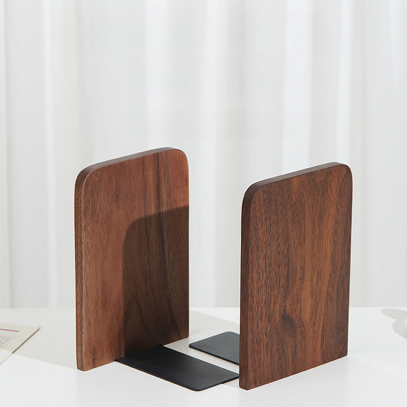 Close-up of natural black walnut wood grain and hand-sanded finish on handcrafted bookends.