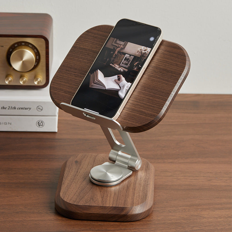 Handcrafted black walnut stand securely holding a tablet for reading, streaming, or video calls.