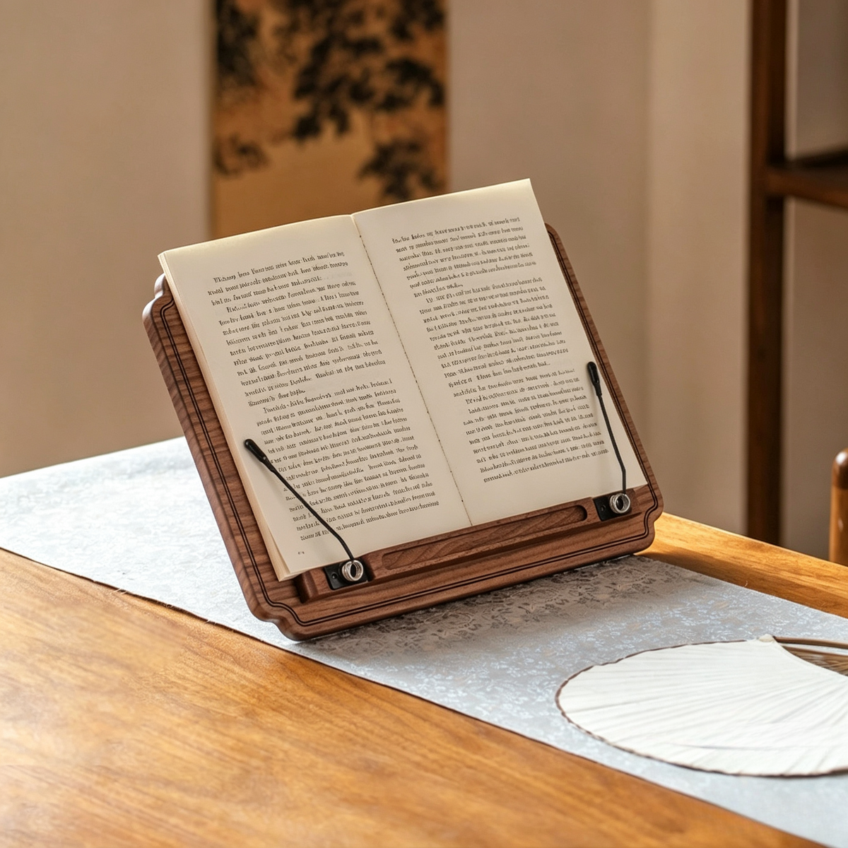 Handcrafted personalized black walnut wood book stand holding an open book on a dining table for comfortable hands-free reading.