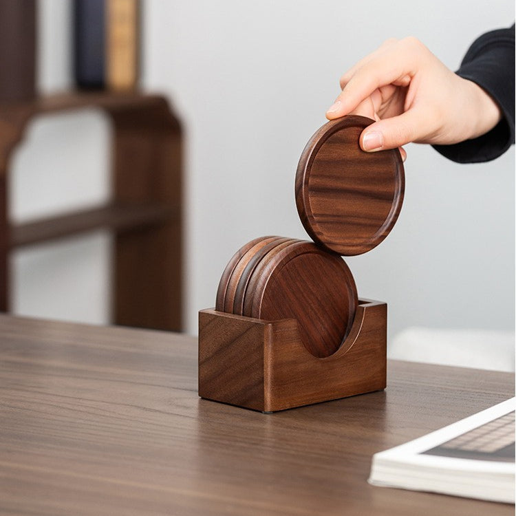 Handcrafted personalized black walnut wood coaster set with matching holder for coffee, tea, and everyday table protection.