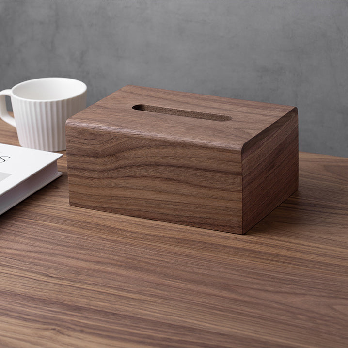 Close-up of handcrafted black walnut wood tissue box cover showing smooth hand-sanded finish and natural wood grain.
