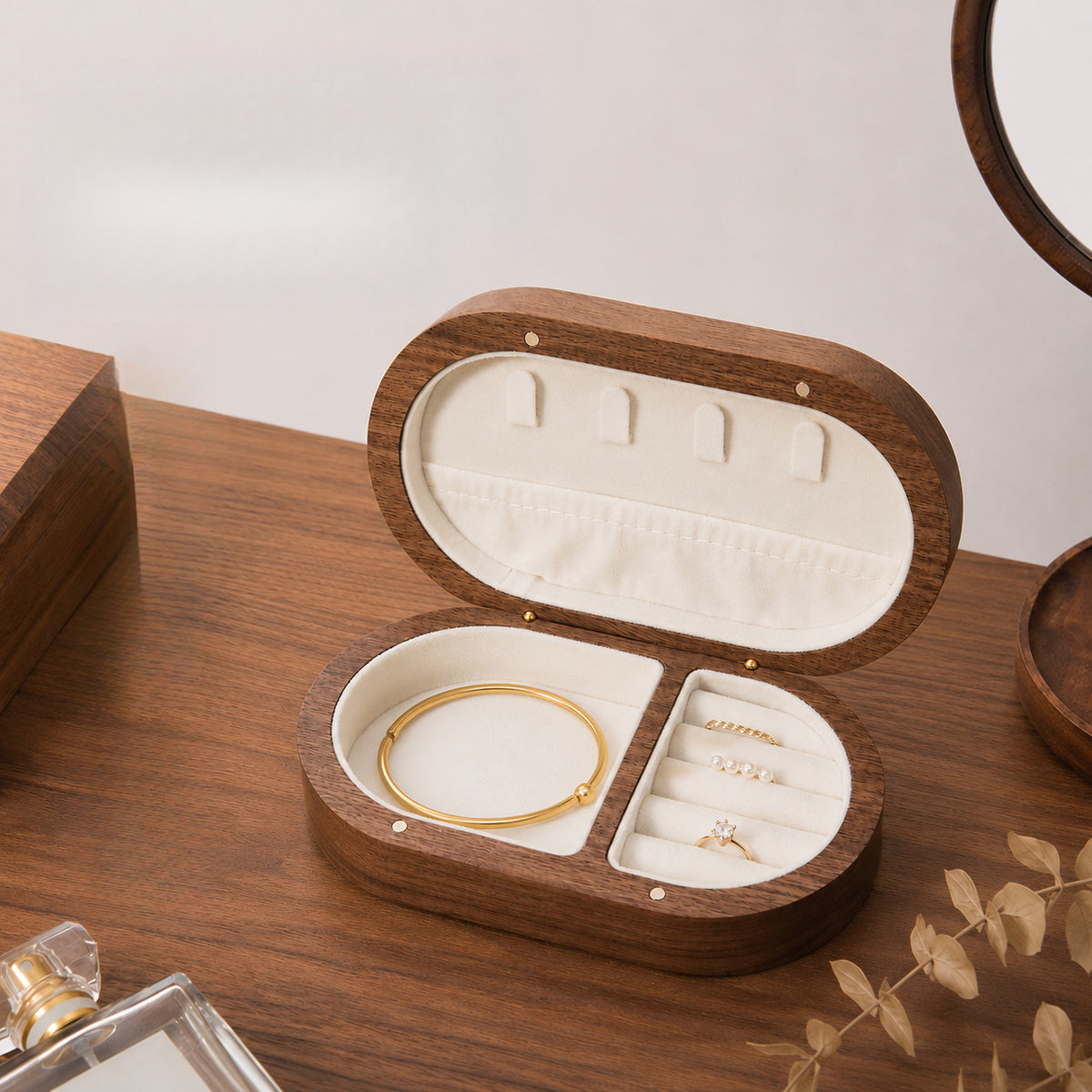 Handcrafted personalized black walnut wood travel jewelry box with compartments for rings, necklaces, earrings, and bracelets.