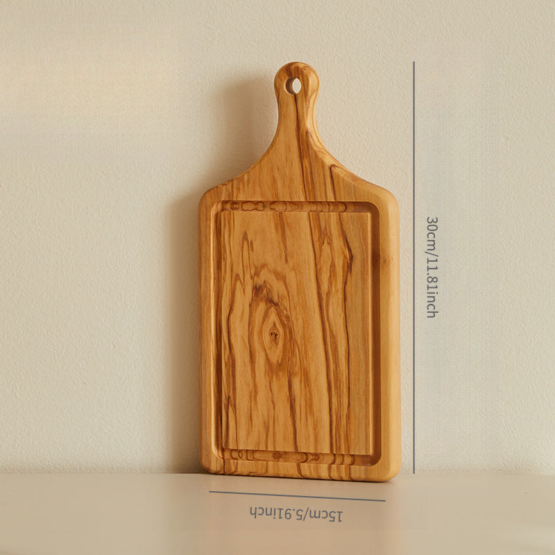 Olive wood serving board with fresh lemon slices and desserts, perfect for steak, cheese, appetizers, and everyday serving.