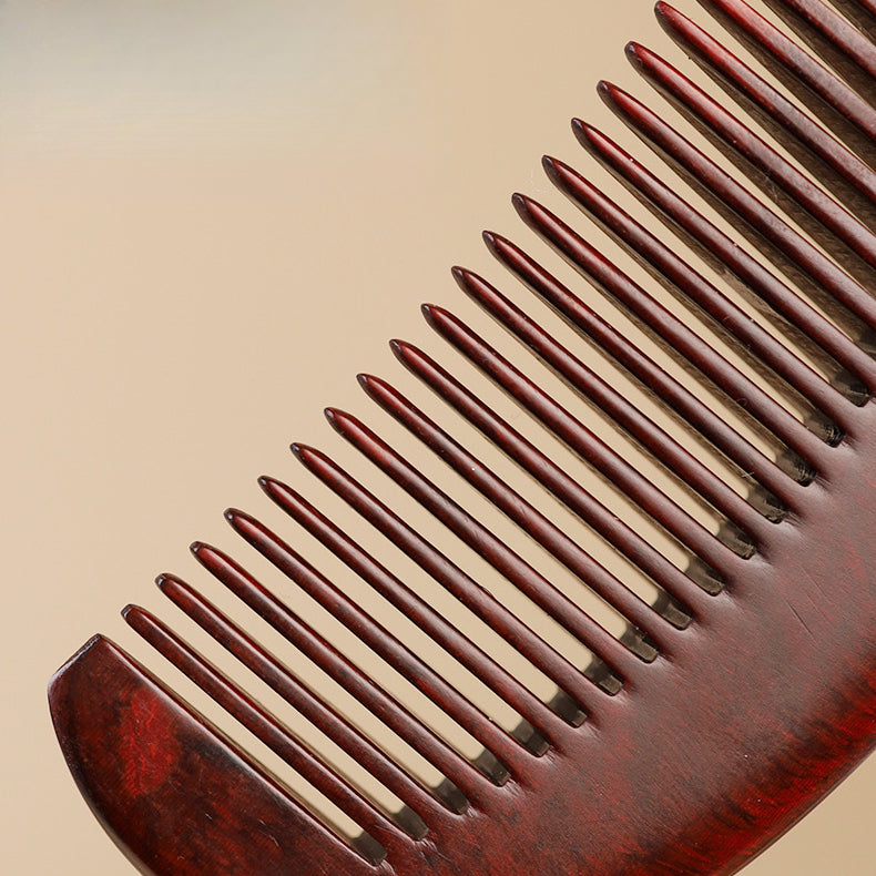 Premium handmade wooden beard comb placed in minimalist lifestyle scene