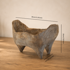 Rustic handcrafted wooden fruit bowl styled as a natural centerpiece for a dining table, kitchen, or warm farmhouse-inspired home.