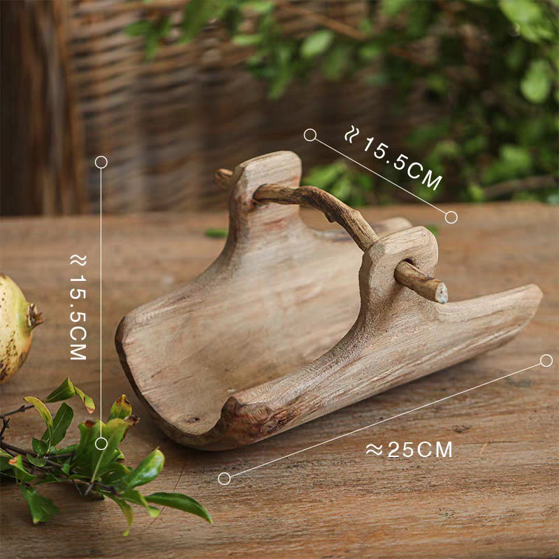 Rustic handmade willow basket designed for fruit storage and versatile organization in a natural home setting.