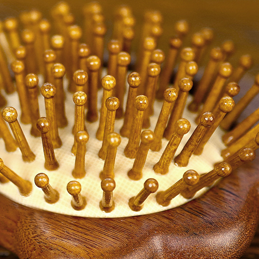 Small handcrafted wood comb designed for kids sensitive scalp care