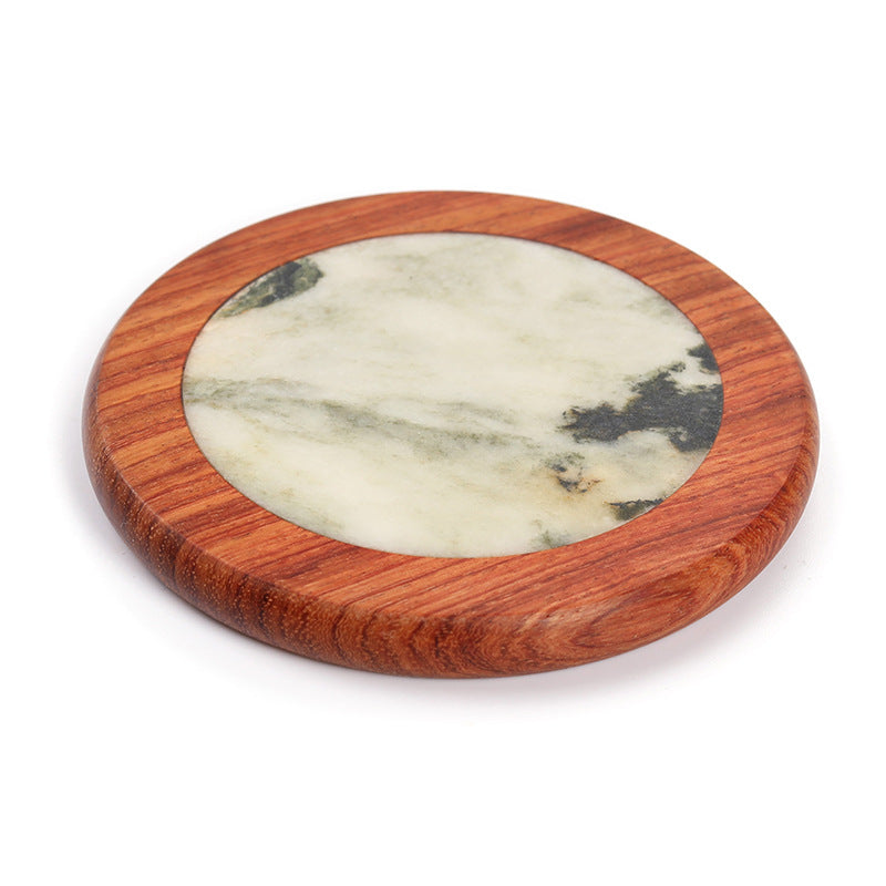 Wabi-sabi style wooden and marble coaster in a calm coffee setting