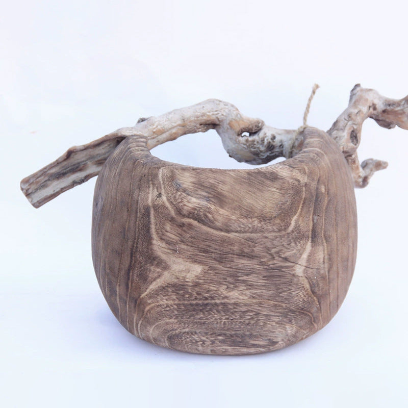 Xigura Patina handcrafted paulownia plant pot, natural grain detail for a warm, quiet home.