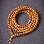 Xigura Patina handcrafted olive wood bracelet, scale and proportion view for a warm, quiet home.