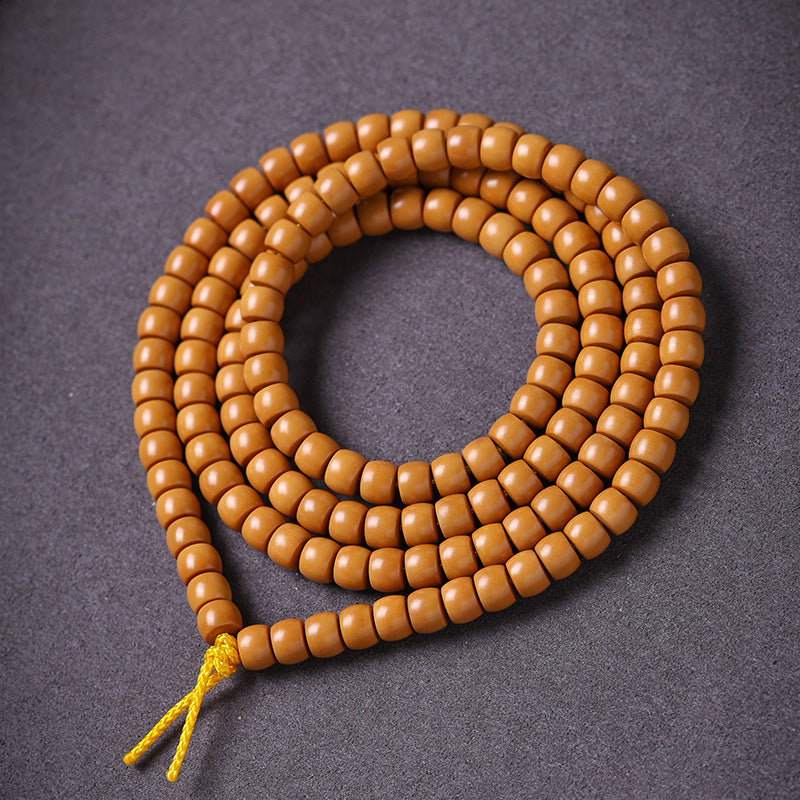 Xigura Patina handcrafted olive wood bracelet, scale and proportion view for a warm, quiet home.