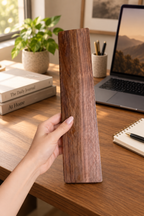 Black walnut wrist rest showing rich natural wood grain and a smooth handcrafted finish.