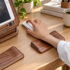 Black walnut wrist rest showing rich natural wood grain and a smooth handcrafted finish.