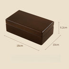 Xigura Patina handcrafted pine jewelry box, daily ritual scene for a warm, quiet home.
