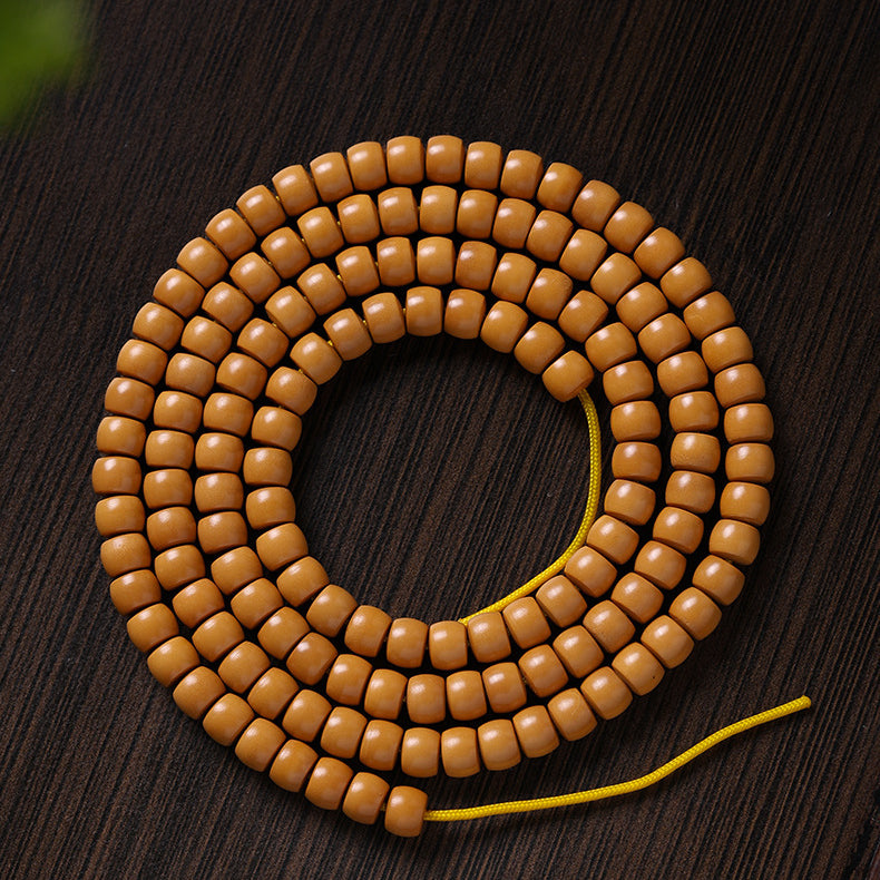 Xigura Patina handcrafted olive wood bracelet, side view for a warm, quiet home.