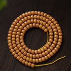 Xigura Patina handcrafted olive wood bracelet, side view for a warm, quiet home.
