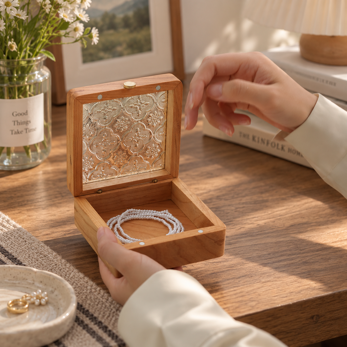 Cherry wood jewelry box with a decorative transparent lid for storing necklaces, bracelets, and small keepsakes.