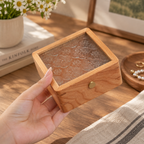 Cherry wood jewelry organizer box for keeping necklaces, bracelets, rings, and small accessories together.