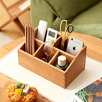 Close-up of the multiple compartments and handcrafted joinery of a cherry wood organizer