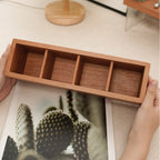 Cherry wood organizer showing natural wood grain, warm color, and visible corner joinery.
