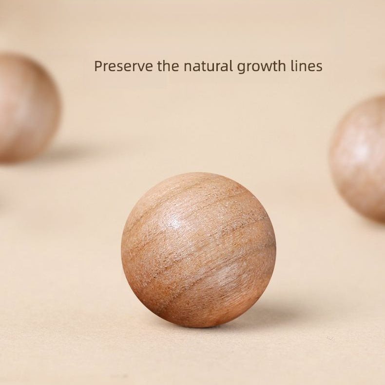 Xigura Patina handcrafted sandalwood wood bracelet, wood texture close-up for a warm, quiet home.